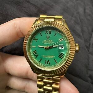 Rolex Gold Watch with Green Dial